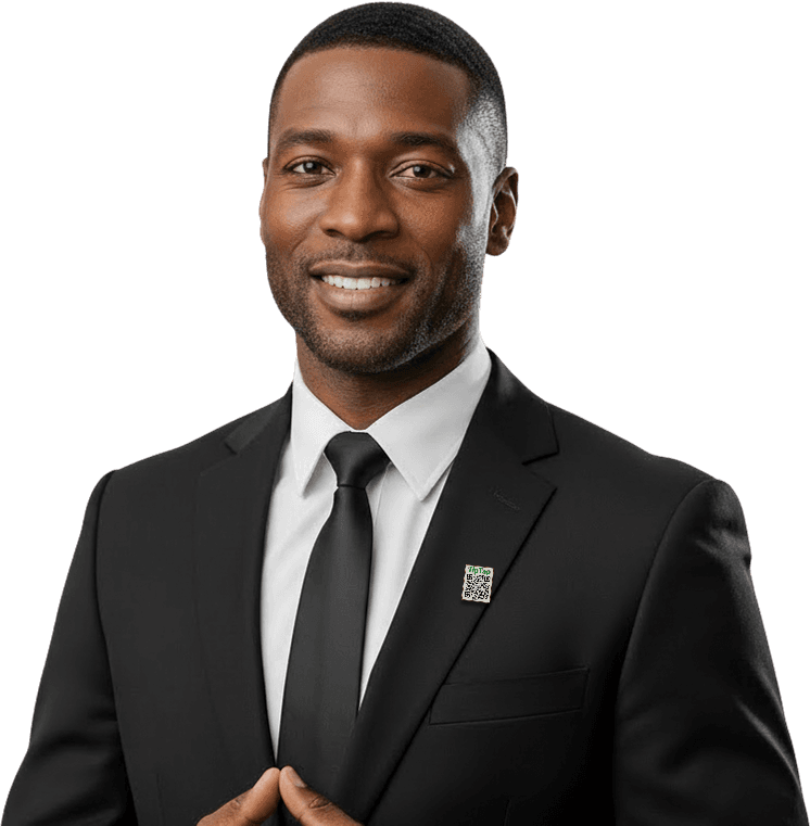 A hotel professional in a suit, wearing a TipTapToe badge